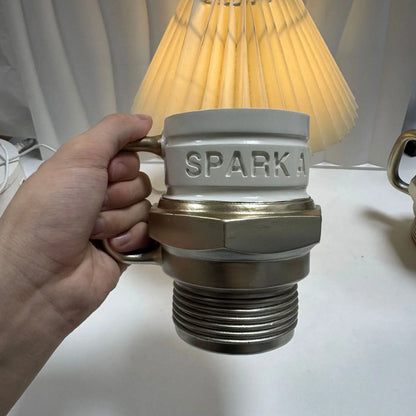 SparkPlugMug, a car enthusiast and collector, has created a unique high-value spark plug mug and coffee cup